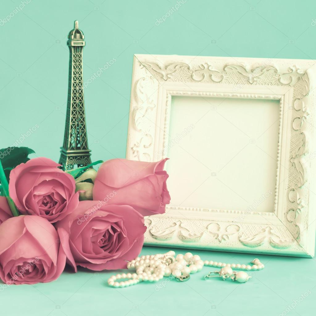 White vintage frame and roses