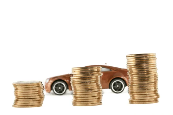 Growing Pile Of Pennies With Car Behind It — Stock Photo, Image