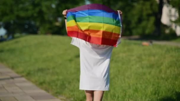 Young Woman Lgbt Pride Flag Walking Park — Stok video