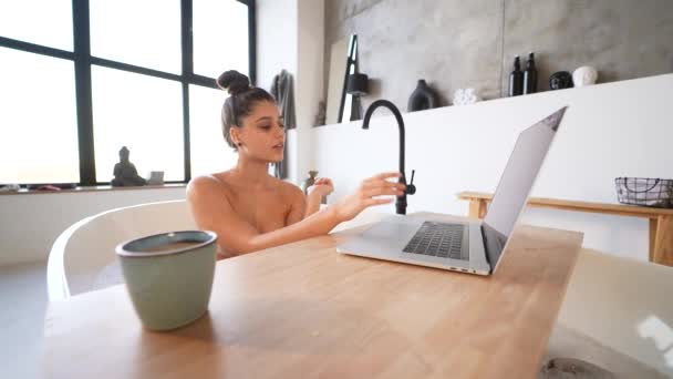 Young Woman Working Laptop While Taking Bathtub Home — Stockvideo
