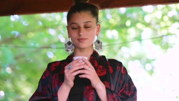 Slow Motion Shot Woman Drinking Tea Bowl Close View — Stockvideo