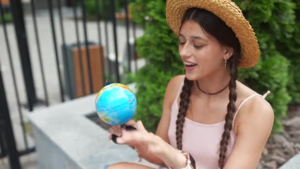 Beautiful Young Woman Holds Small Globe Her Hands Lifestyle Travel — Stok video