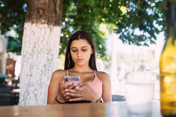 Photo Charming Pretty Young Lady Communicating Modern Gadget Smiling Urban — Stok fotoğraf