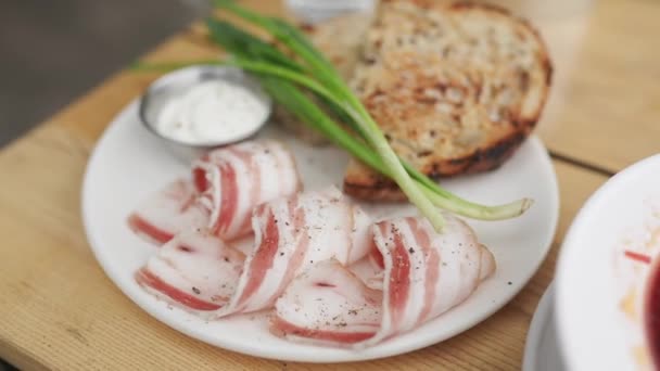 Slices Bread Lard Green Onions Plate Close — Vídeo de stock