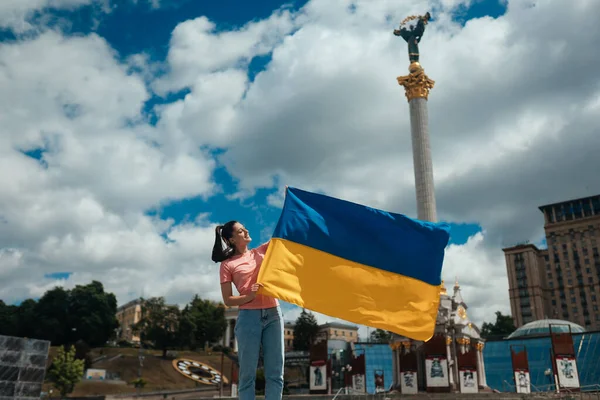 Young Woman Holding National Flag Ukraine City — Fotografie, imagine de stoc