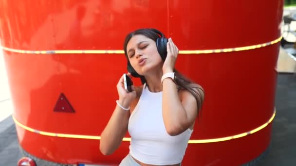 Portrait Happy Girl Listening Music Online Wireless Headphones Smartphone Street — Stock Video