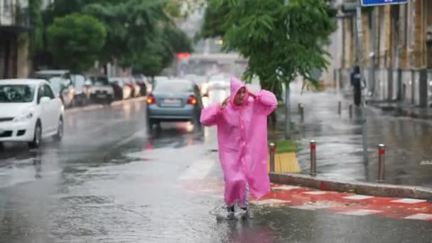 Young Smiling Woman Pink Raincoat Street While Enjoying Walk City — Video