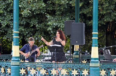 Tango band Tango Calor performing a Sunday afternoon concert in the bandstand in Grove Park, Weston-super-Mare, UK on 28 August 2022.