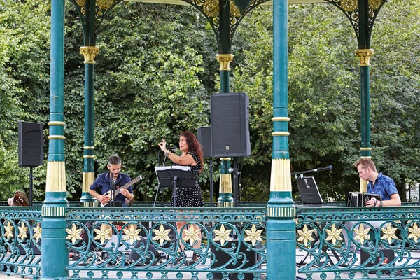 Tango band Tango Calor performing a Sunday afternoon concert in the bandstand in Grove Park, Weston-super-Mare, UK on 28 August 2022.