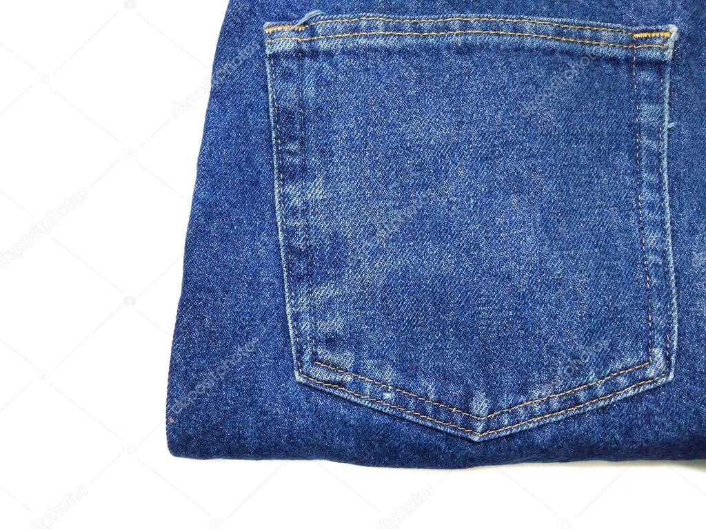Blue jeans texture with pockets White background copy space