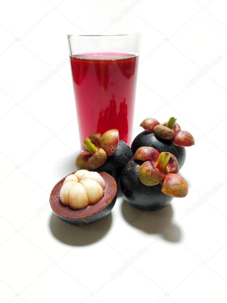 mangosteen on a white background tropical fruit It is popular with Thais and Asians.