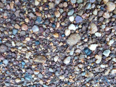 Küçük çakıl taşları rengarenk plaj arka plan dokusu