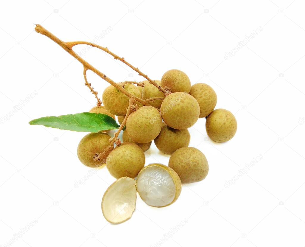 A bunch of yellow longans on a white background.  It is a Thai fruit that is sweet, juicy and nutritious.