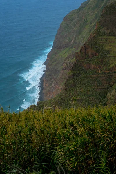 The cliff and the Achadas da Cruz cable car, in Madeira