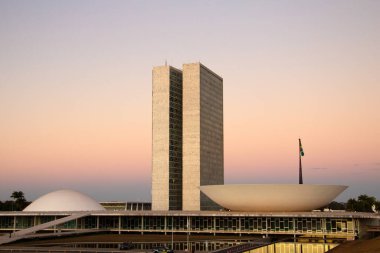 The Braslia National Congress with the light of the sunset in the late afternoon.