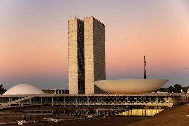 The Braslia National Congress with the light of the sunset in the late afternoon.