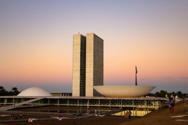 The Braslia National Congress with the light of the sunset in the late afternoon.