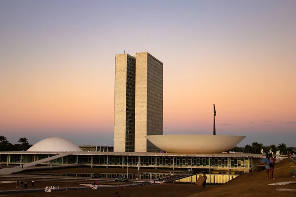 The Braslia National Congress with the light of the sunset in the late afternoon.