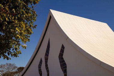 Queen of Peace Military Cathedral. Detail of the top of the church on a sunny day with blue sky. Side view.