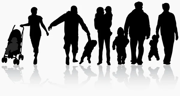 Family silhouettes — Stock Vector