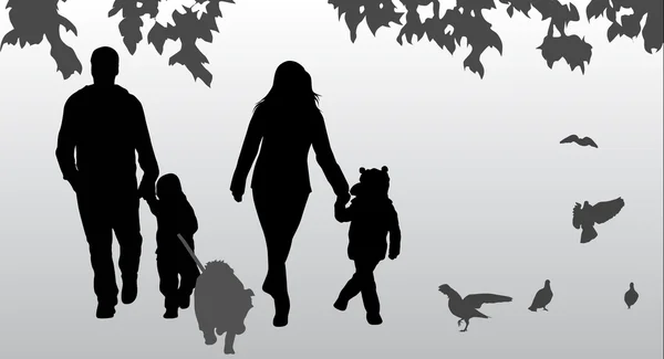 Family silhouettes — Stock Vector