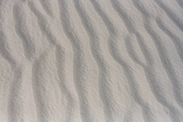 輝く砂の波紋テクスチャスパン背景画像 — ストック写真