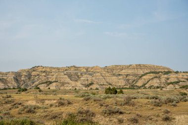 Eroked Hillside, Theodore Roosevelt Ulusal Parkı 'ndaki ovadan yükselen çorak topraklar oluşturdu.
