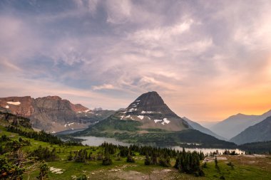 Color of Sunset Begins To Glow Over Hidden Lake in Glacier National Park