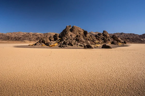 The Dry Texture of The Racetrack Playa Circles The Grandstand in Death Valley