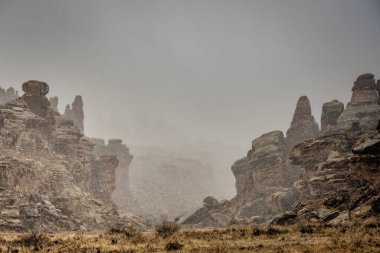 Thick Fog and Snow between Hoodoo Formations in the Needles District