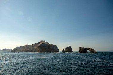 Arch Rock And Anacapa Lighthouse From The Water alongside the Channel Islands National Park