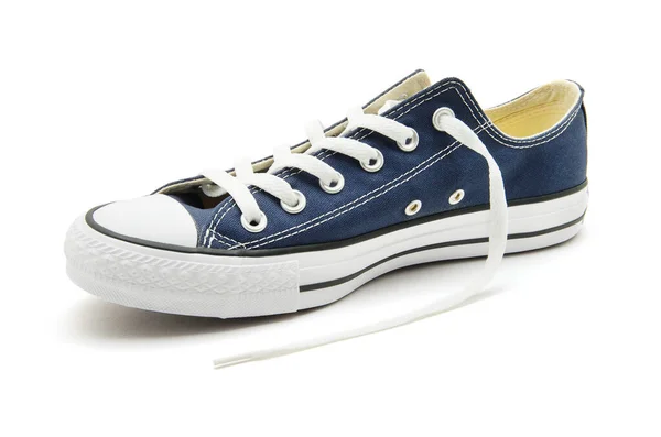 白色背景的蓝色运动鞋 — 图库照片