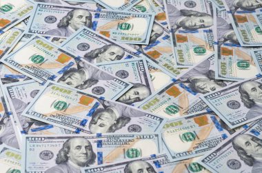 100 dolarlık banknotların arkaplanı