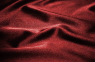 Arkaplan olarak kırmızı saten veya ipek kumaş