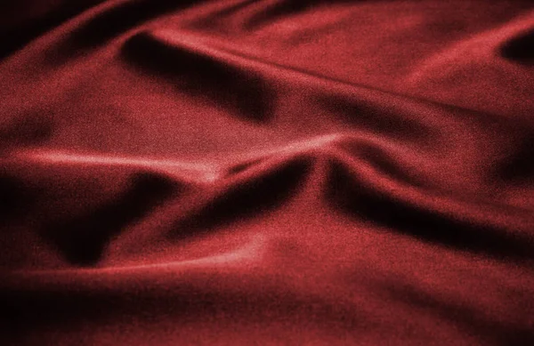 Arkaplan olarak kırmızı saten veya ipek kumaş