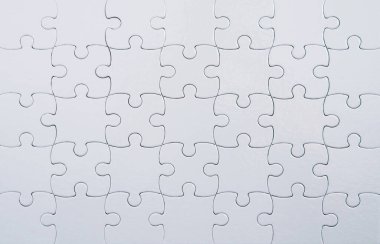 Beyaz yapboz arkaplanının kapanışı.