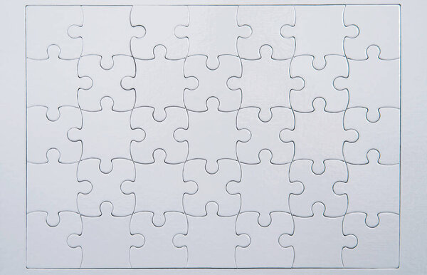 Closeup of white puzzle background.
