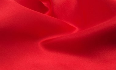 Arkaplan olarak kırmızı saten veya ipek kumaş