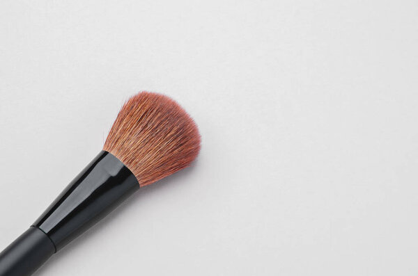 make up brush powder blusher on white background