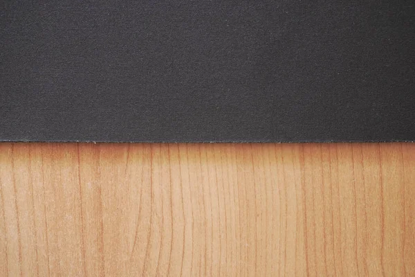 Schwarzes Leder Auf Holztisch — Stockfoto