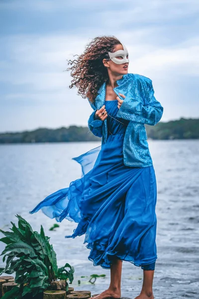 Elegant Woman Blue Dress Masquerade Standing Water — Stockfoto
