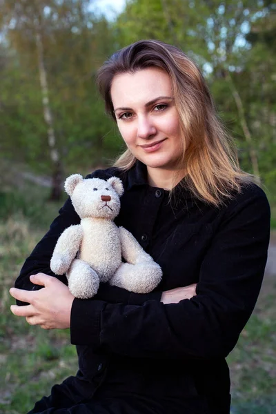Young Woman Holding Teddy Bear Outdoors Nature —  Fotos de Stock