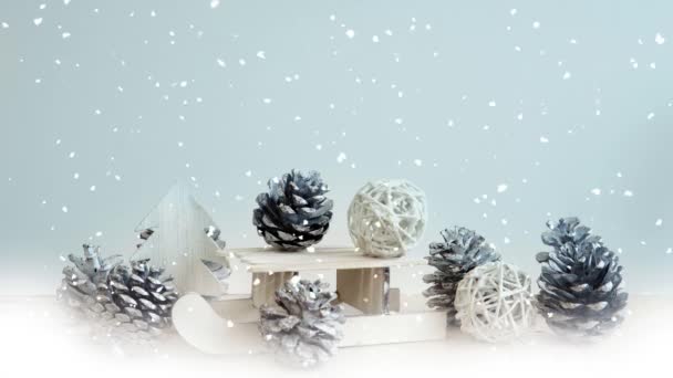 Cinemagraph Miniature Landscape Toy Sleigh Pinecones Wooden Tree Snowflakes — Vídeo de Stock