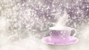 Cinemagraph of coffee cup outdoors with snowflakes
