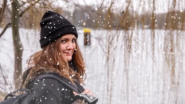 Cinemagraph Young Woman Outdoors Lake Snowy Day — Stock video
