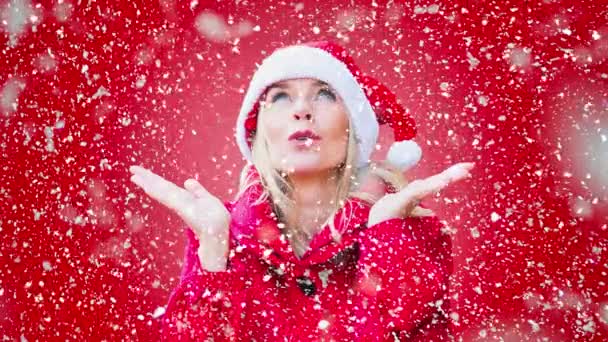 Cinemagraph Blond Woman Dressed Santa Claus Red Background Lots Snow — Video