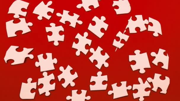 Cinemagraph Moving White Puzzle Red Background — Vídeos de Stock