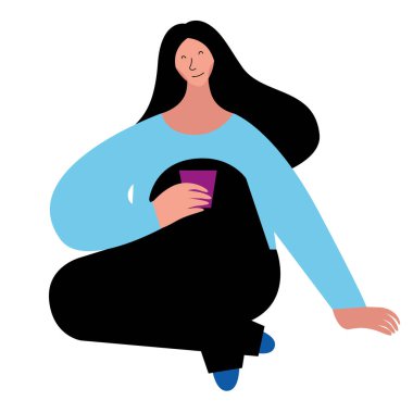 A woman sitting on the floor with a cup in her hands