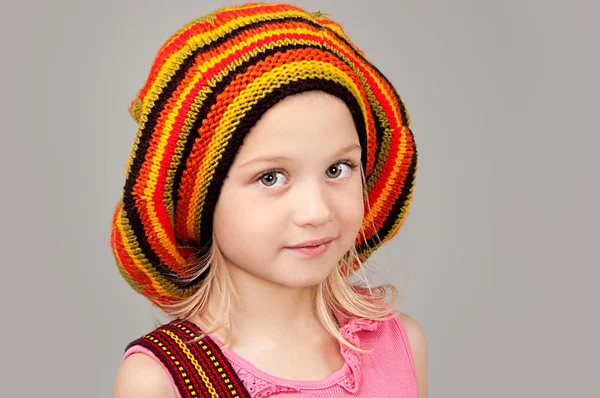 Adorable little girl looking at the camera — Stock Photo, Image