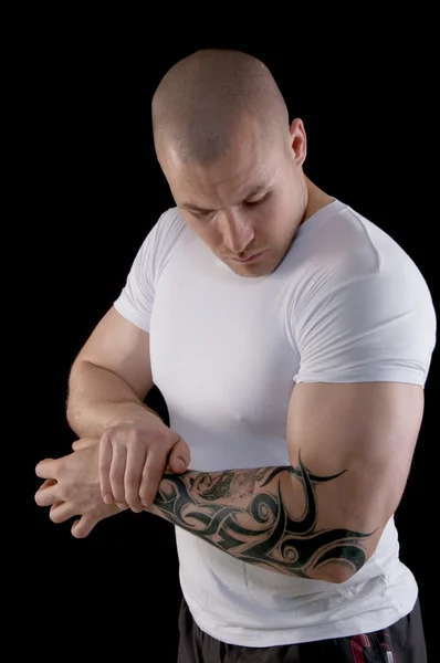 Muscular man with tattoo — Stock Photo, Image